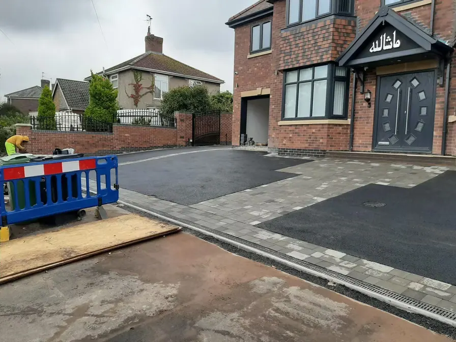 New surface with block paved edging