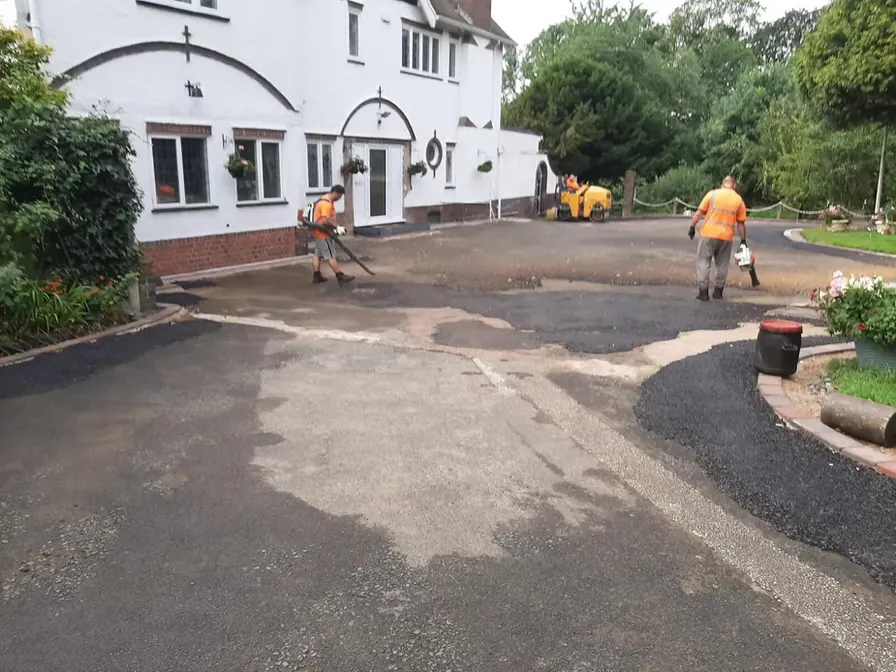 Surfacing outside a white building